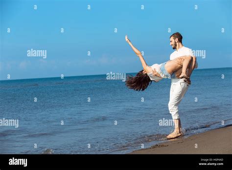 Romance On Vacation Couple In Love On The Beach Flirting Stock Photo Alamy