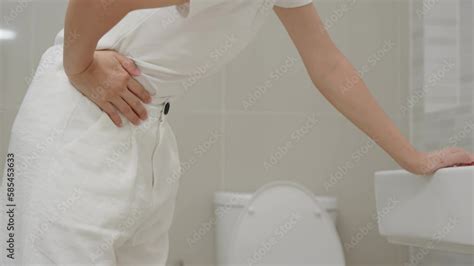 Constipation And Diarrhea In Bathroom Hurt Woman Touch Belly Stomach