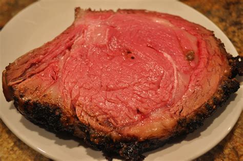 Keep a firm grip on the bones with one hand and use your knife to slice the meat next to the bone so it follows the curve. My Hawaiian Home: Perfect Prime Rib Standing Rib Roast