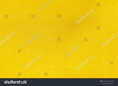 Flat Goldcolored Glossy Fabric Texture Background Stock Photo