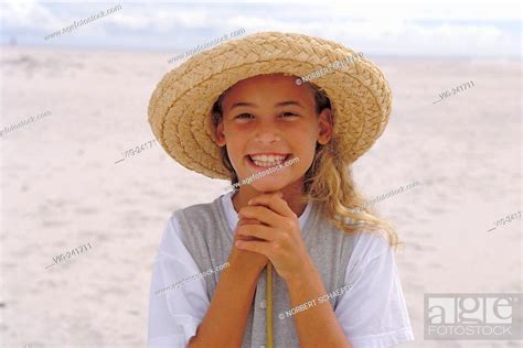 Beach Scene Portrait 10 Year Old Blond Curly Girl Wearing Strawhat