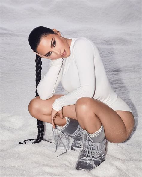 kim kardashian s silver metallic moon boots on instagram november 17 2020 white long sleeve