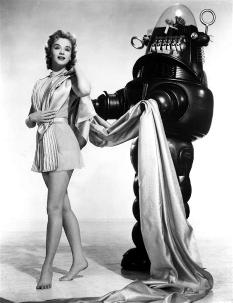 behind the scenes photos of anne francis with robby the robot in a promotion shot for ‘forbidden