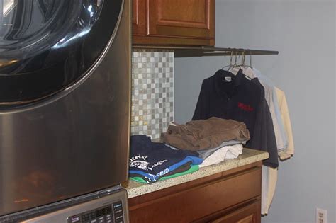Laundry room remodel laundry room organization laundry room design laundry shelves organization ideas organizing storage ideas laundry room makeovers new york closet collection clothing rod & shelf. Cheap DIY Clothes Rack- Laundry Room Pull-Out Clothes ...