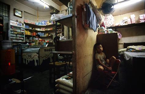 Amazing Photographs Capture Daily Life In Kowloon Walled