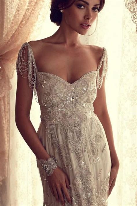 This classic yet striking wedding gown offers additional coverage to our kendall style. The Hottest 2014 Trend: 53 Stunning Beaded Wedding Dresses ...