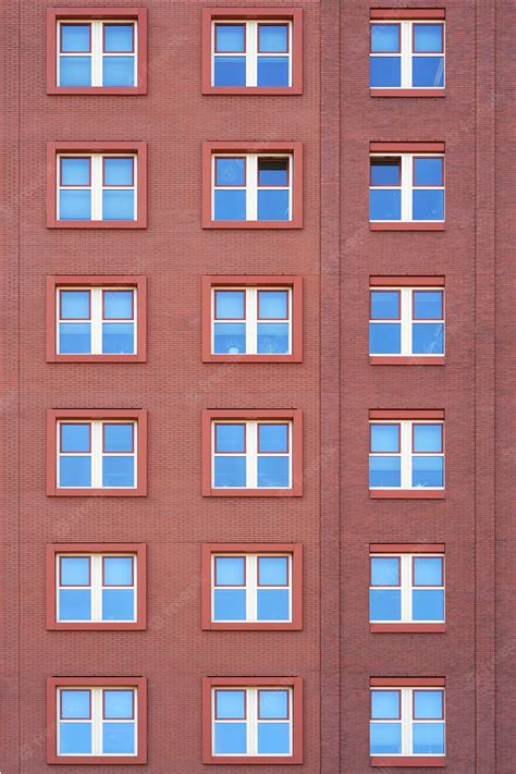 Premium Photo Windows Of A Brick Building Texture