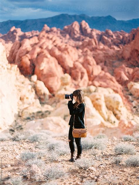Woman Taking Picture In Desert By Stocksy Contributor Daniel Kim