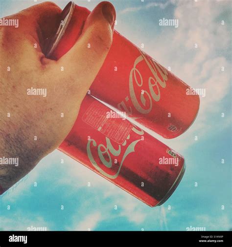 Hand Coca Cola Can Sky Hi Res Stock Photography And Images Alamy
