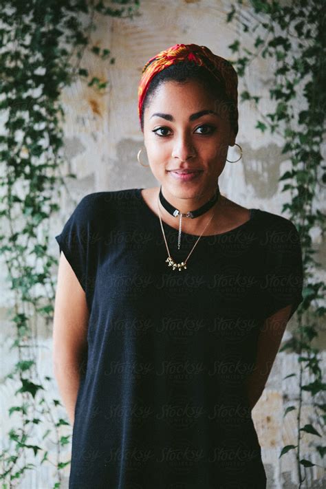 Portrait Of A Beautiful Young Mixed Race Woman Framed By Ivy By Stocksy Contributor Kkgas