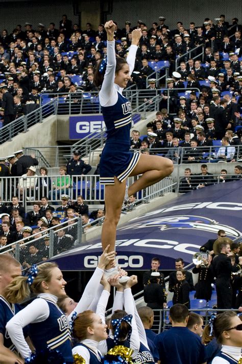 Navy Cheerleaders Try To Get The Crowd Involved During The Navy Vs