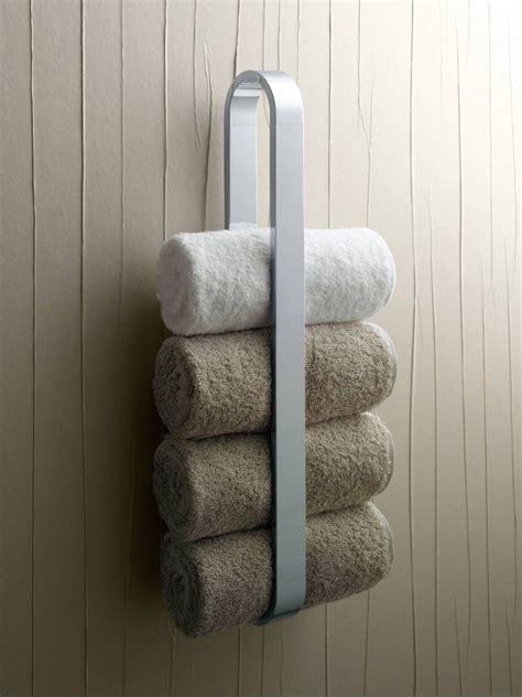 One way to join practical storage and beautiful decoration is to add more towel bars and rings to your bathroom. Small Bathroom Towel Rack Solution | Towel holder bathroom ...