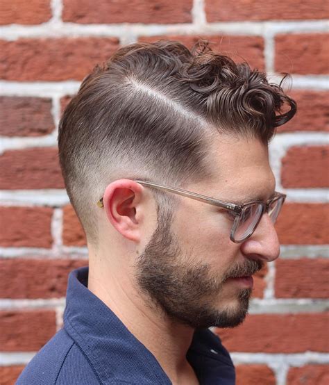 The sides may also be tapered or faded, which is called a comb over fade haircut. 21 Comb Over Haircuts -> Cool New Styles For 2020