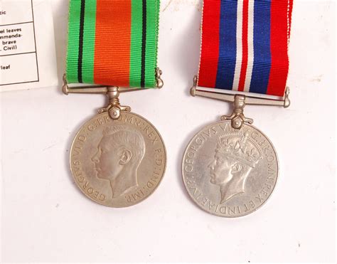 A Wwii Second World War Medal Pair Comprising Defence Medal And War