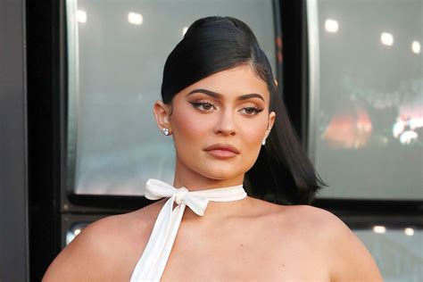Kylie Jenner Wears An Catsuit From Asos With PVC Sandals Footwear News
