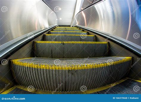 Escalator Staircase And Exit To Light Royalty Free Stock Photo