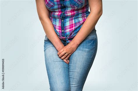 Woman With Hands Holding Her Crotch She Wants To Pee Stock Photo Adobe Stock
