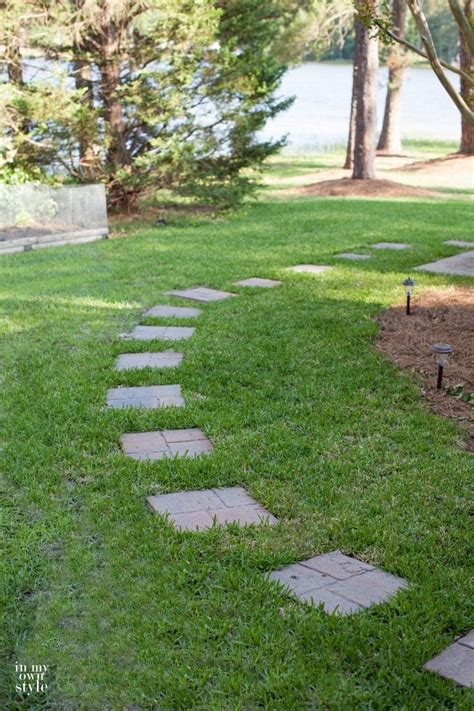 In most cases, the grass seeds can go everywhere when you do it each season. Simple Paver Stone Walkway | In My Own Style
