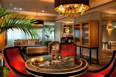 If you have to make or take a phone call, do it outside. Cigar Lounge at the Kempinski hotel. | Cigar lounge, Lounge design, Luxury