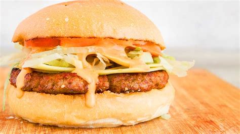 Add dijon mustard & chilli flakes to give these patties a slight kick and pair with caramelised onions. Chargrill Charlie's classic cheese beef burger - 9Kitchen