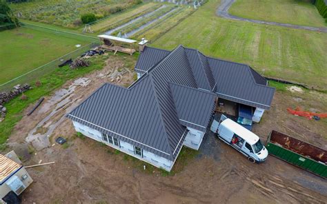 New Construction Residential Home With Aluminium Charcoal Grey Roof