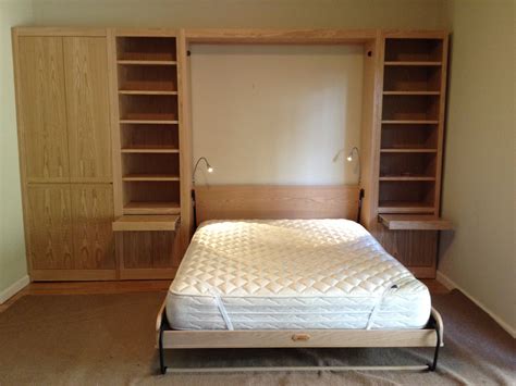 No Frills Murphy Bed With Adjacent Bookcases And Wardrobe Murphy Bed