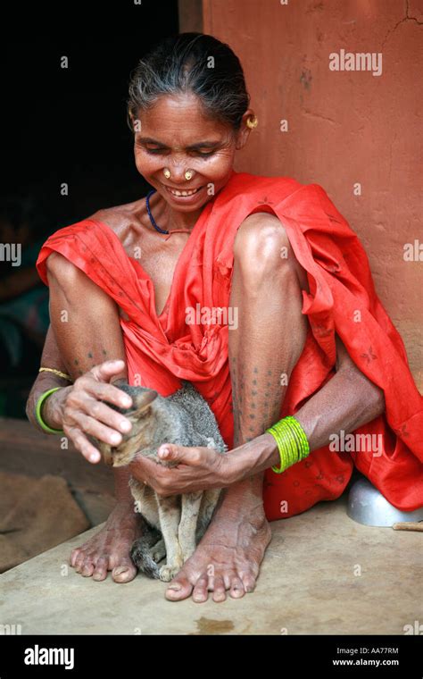 Woman And Cat At Sarap Village Orissa India Stock Photo Alamy