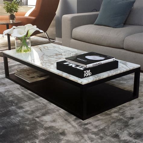 Contemporary coffee table with black glass top. Verona Marble & Wood Coffee Table