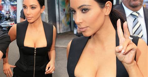 Kim Kardashian Flashes Major Cleavage In Dangerously Low Cut Top As She Heads Out For Dinner In