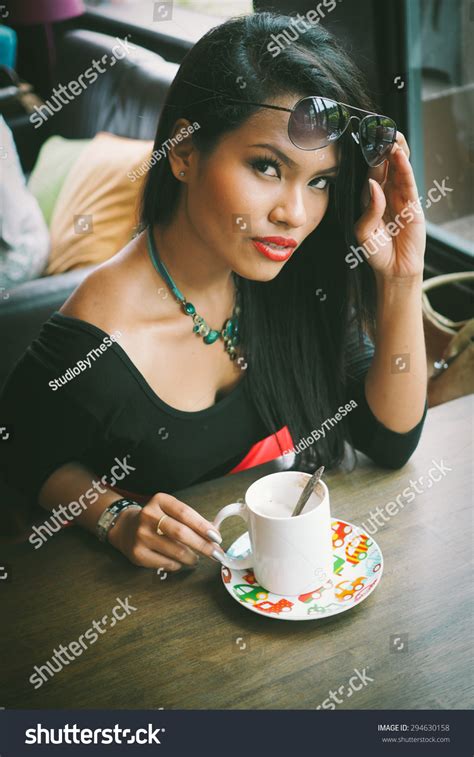 Asian Sexy Girl With Cup Of Coffee In Coffee Shop Vintage Color Stock