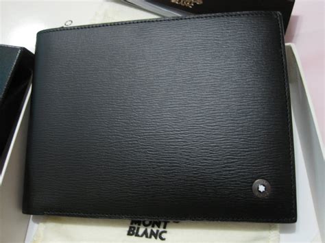 Made from saffiano leather print, this wallet stands in the long traditions of crafting products with fine leather quality. shop4luxurygifts: WTS BNIB Montblanc Mont Blanc westside 4810 4cc wallet with coin case