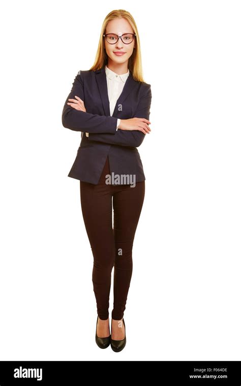 Full Body Shot Of Young Businesswoman With Her Arms Crossed Stock Photo