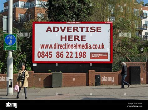 advertise here, billboard inviting advertisers to advertise, in Stock ...