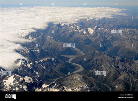 Air View Of The Southern Alps Partially Covered With The Long White