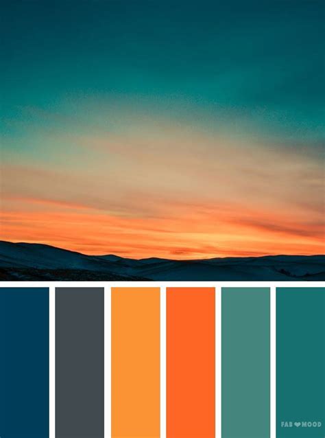 An Orange And Blue Color Palette With The Sun Setting In The Sky Behind It