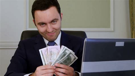 Successful Businessman Counts Looking Satisfied Stock Video Footage 00