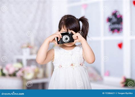 Little Girl Holding An Old Camera Stock Image Image Of Happiness