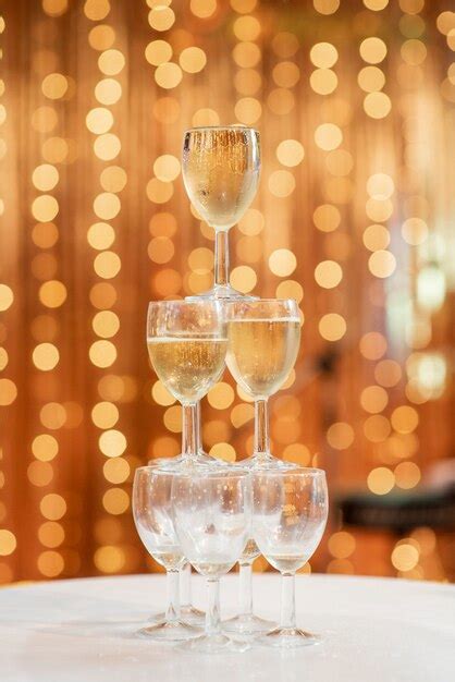 Premium Photo | Champagne glasses in wedding decorations