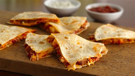 Quesadillas are a ridiculously uncomplicated dish: Quick Chicken Quesadillas Recipe - BettyCrocker.com