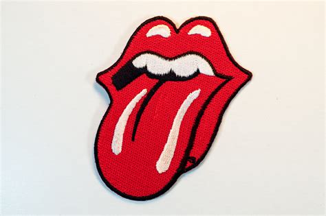 The red color to the whole mouth gives it sensuous and a sort of insolent look, depicting the passion and vitality that lies in the rolling stones compositions. Rolling Stones Logo Wallpaper - WallpaperSafari