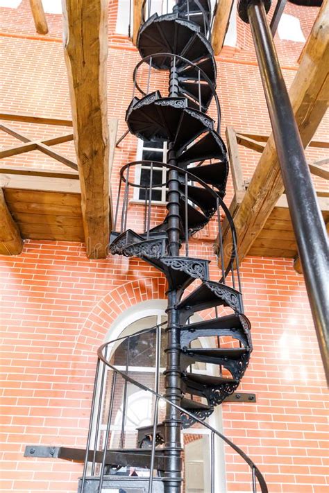 Old Spiral Staircase Made Of Cast Iron In The Water Tower Stock Photo