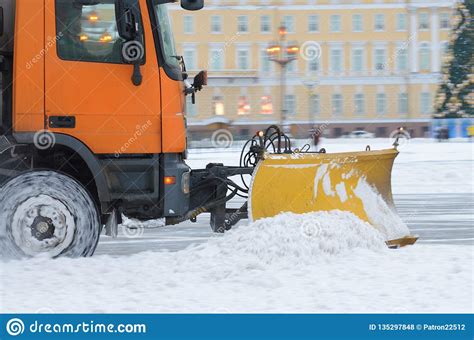 Snow Removal Vehicles On The Streets Stock Photo Image Of Snowplough