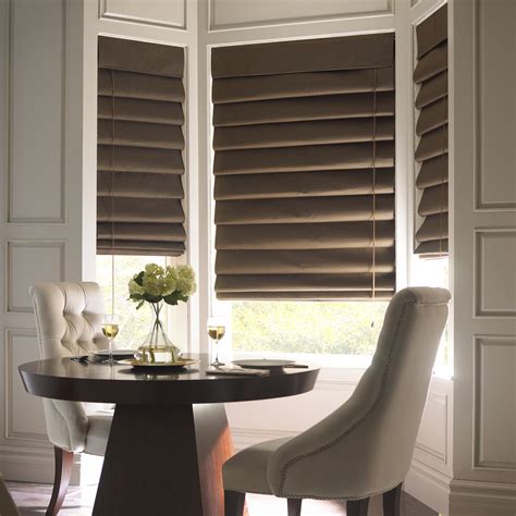 Roman shades can look very elegant in a room due to their clean lines and tailored appearance. Roman Shades - Online Examples of Different Options