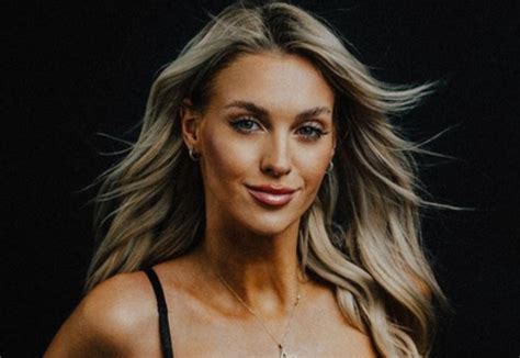 veronika rajek goes viral in black lingerie showing off massive boobs and six pack abs