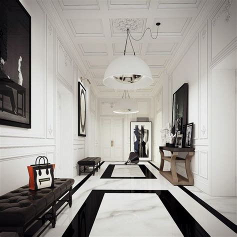 A Long Hallway With Black And White Flooring Framed Pictures On The