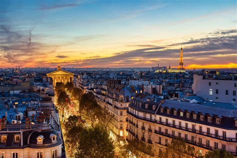Aerial View Of Illuminated Paris At Dusk With Eiffel Tower Stock Image