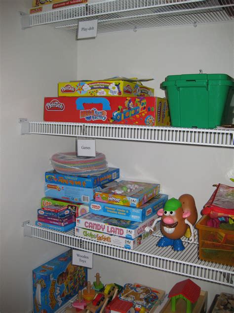 Organization ideas for small closets. Toy closet organization...badge holders and clips from ...