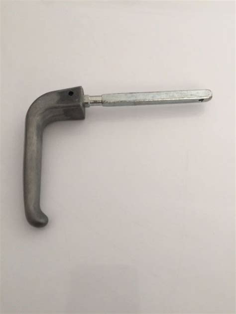 Heavy gauge construction and positive latching mechanism maintain building security. Bilco RPRS8 Turn Handle Assembly - Shaft Length: 4-5/8"