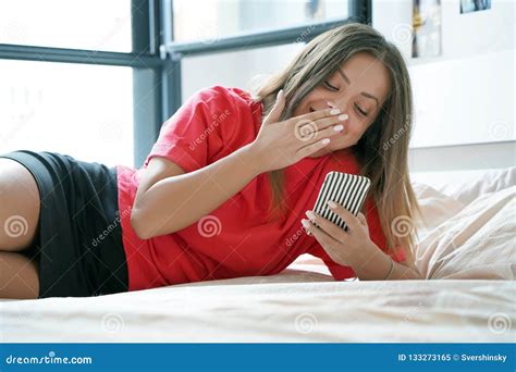 Girl In Bed With A Smartphone Stock Image Image Of Beautiful Happy