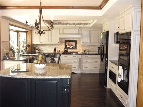 Cream Color Cabinets With Painted Black Island Cabinets Against Dark